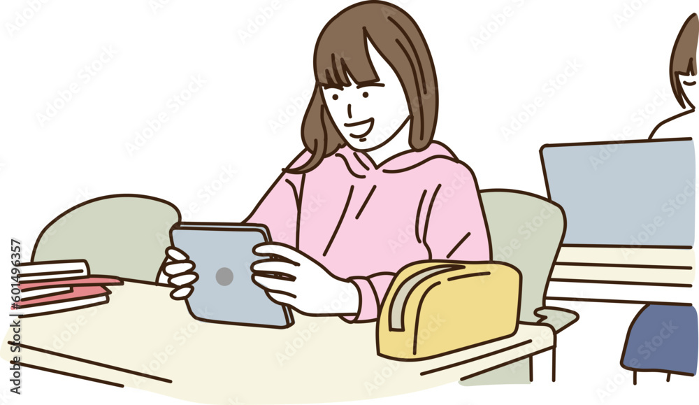 笑顔でタブレットを操作する女の子
笑顔でタブレットを操作する女の子