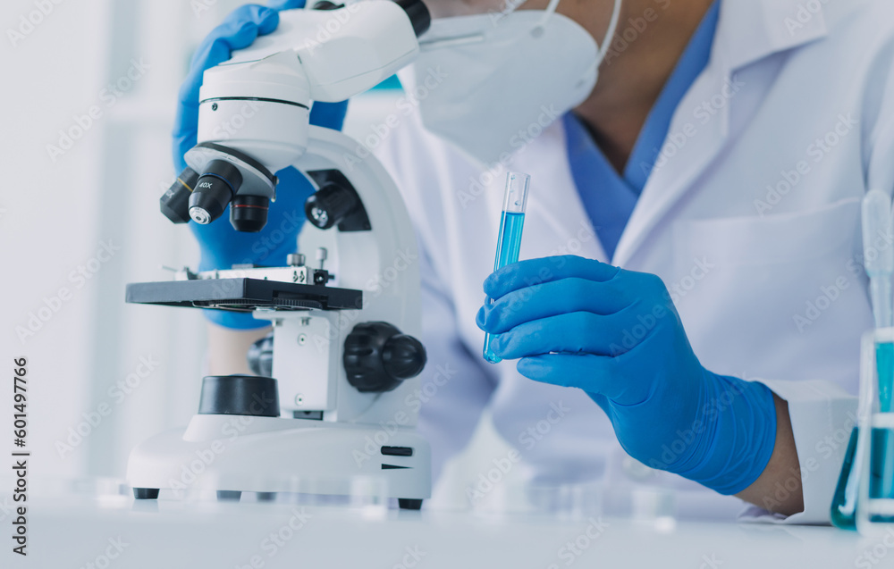hand of scientist with test tube and flask in medical chemistry lab blue banner background hand of scientist with test tube and flask in medical chemistry lab blue banner background