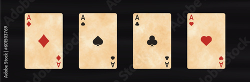 Four playing cards with aces