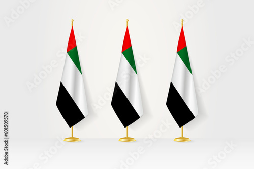 Three United Arab Emirates flags in a row on a golden stand, illustration of press conference and other meetings.