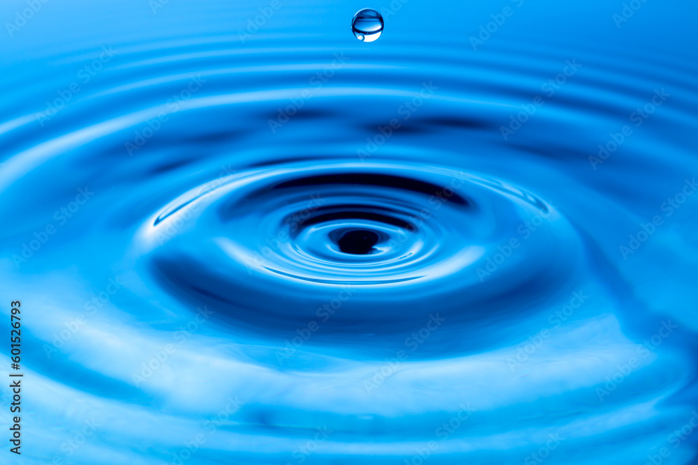 Macro water drop,Blue splash water droplets round water droplets in glass drops, splashes, sprays, abstract shapes out of water Macro water drop,Blue splash water droplets round water droplets in glass drops, splashes, sprays, abstract shapes out of water