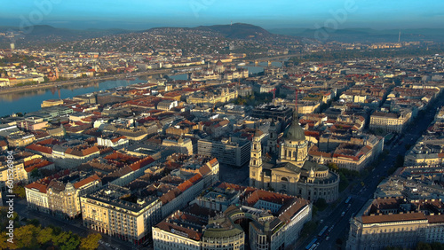 Aerial view of Budapest city skyline and St Stephens Basilica at sunrise  Hungary