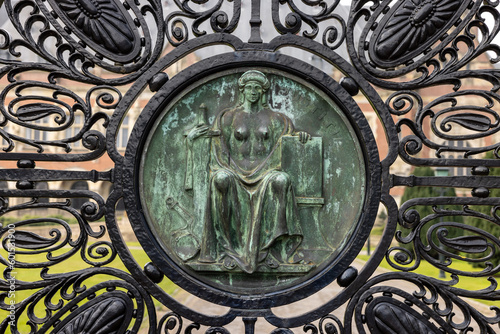 Figure of Justice (Justitia) on the black wrought iron gates of the Peace Palace in The Hague, which houses the International Court of Justice photo