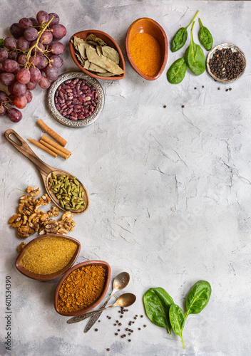 spices and herbs on a stone table