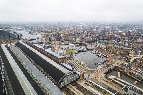 Aerial drone view of Amsterdam Centraal Central Railway Station, Netherlands. High quality photo