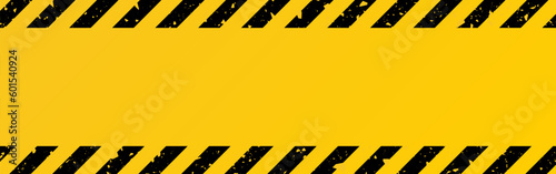 Hazard texture. Yellow and black template. Warning with diagonal stripes. Construction border design. Industrial banner with attention symbol. Vector illustration