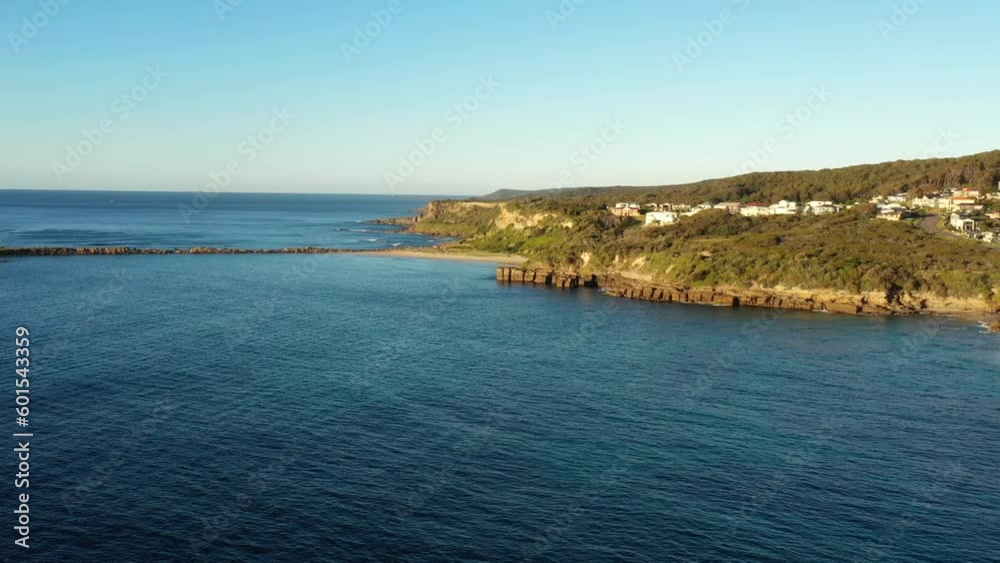 Wide aerial landscape panorama of scenic sea caves coast in Caves beach
Wide aerial landscape panorama of scenic sea caves coast in Caves beach