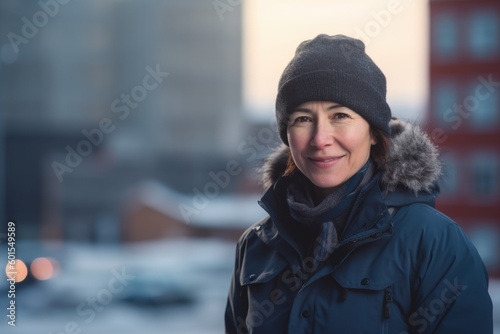 Portrait of a beautiful middle-aged woman in a winter jacket.