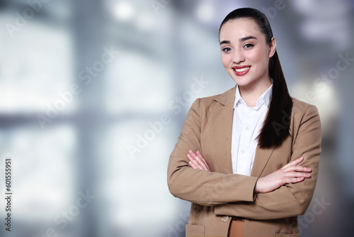 Beautiful real estate agent in office, space for text