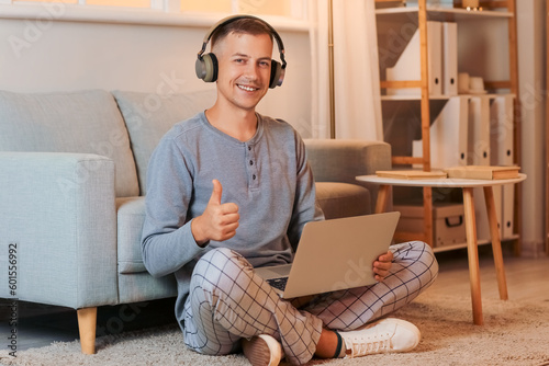 Young man with headphones a...