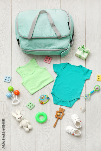 Stylish bag with clothes an...