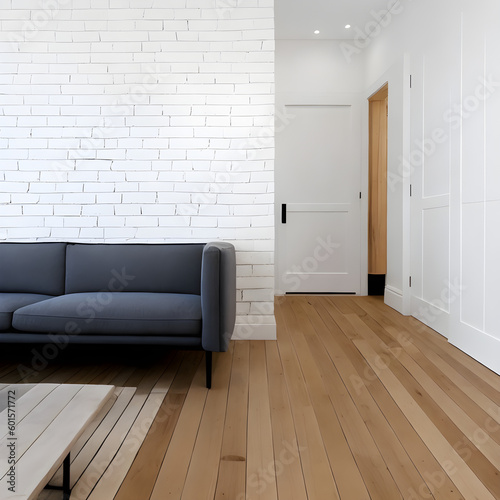 simple room with a comfy sofa and clean wood floor.