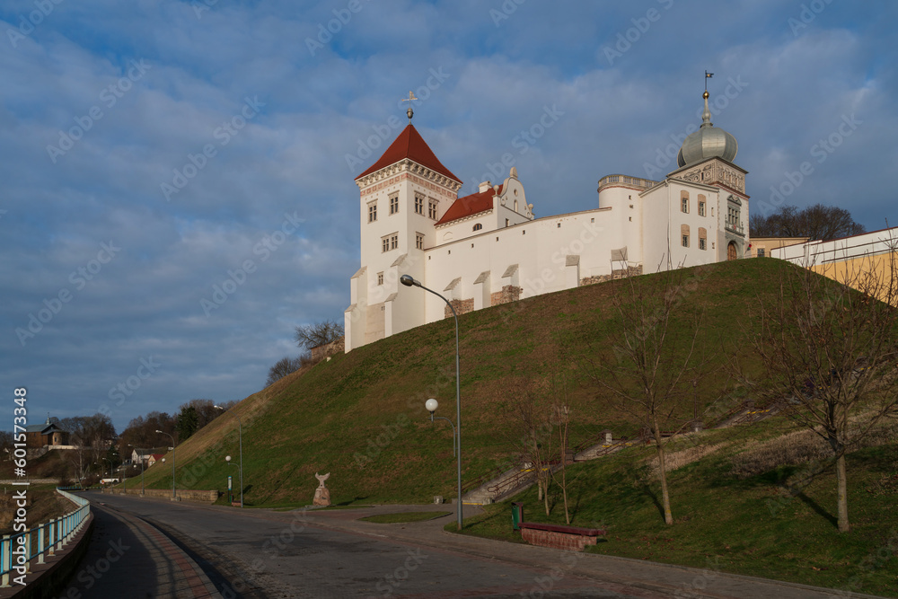 View of the Grodno Old Castle (Grodno Upper Castle) on the banks of the Neman River on a sunny day, Grodno, Belarus View of the Grodno Old Castle (Grodno Upper Castle) on the banks of the Neman River on a sunny day, Grodno, Belarus