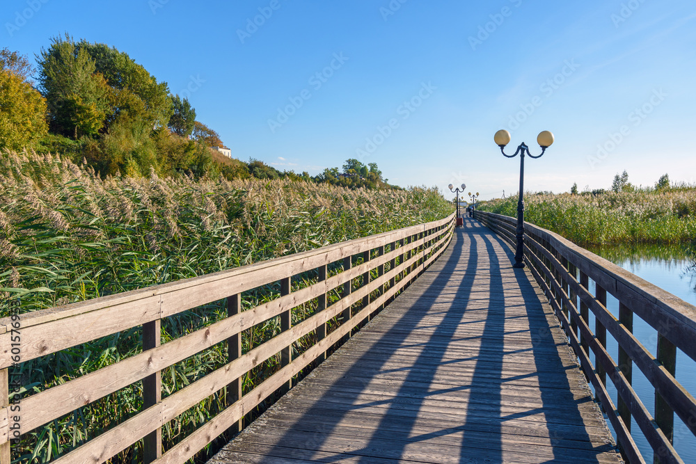 Wooden promenade along the Baltic Sea coas. Yantarny. Kaliningrad region. Russia