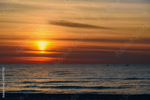 Spectacular bright golden sunset over Baltic sea