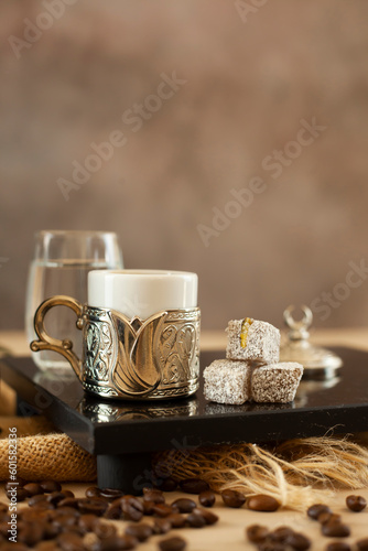 Traditional Turkish coffee. Concept presentation with coffee beans and traditional objects. (ID: 601582336)