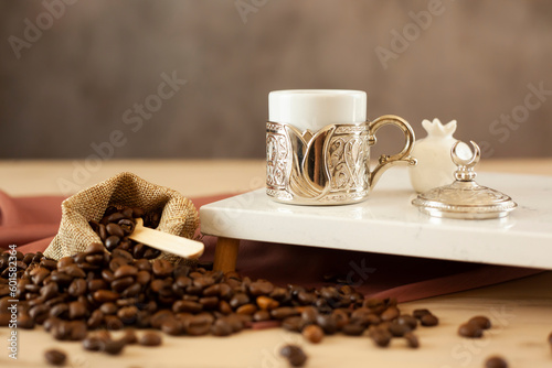 Traditional Turkish coffee. Concept presentation with coffee beans and traditional objects. (ID: 601582364)