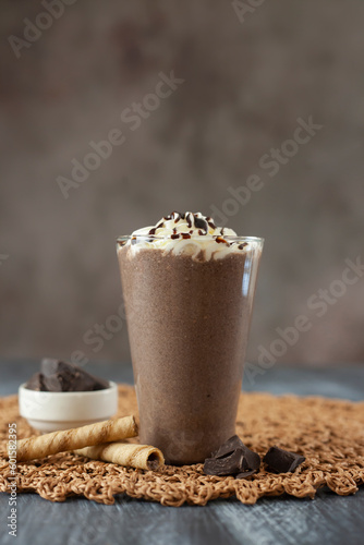 Coffee and cream frappe. With coffee beans and concept presentation. (ID: 601582395)