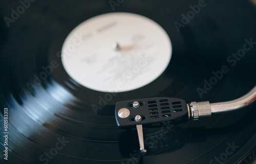 Close-up vintage vinyl record player. Retro audio equipment turntable.