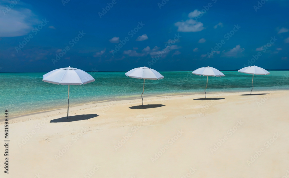 Summer tropical with white umbrella on the beach with  blue sky background