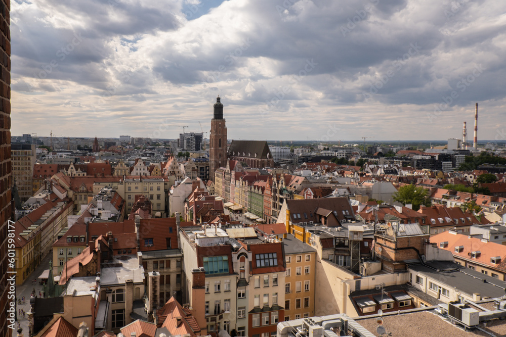 View from above, aerial Wroclaw central market square with old houses. Historical capital of Silesia, Europe. City hall architecture buildings. Old town landmark cathedrals church. Travel tourist