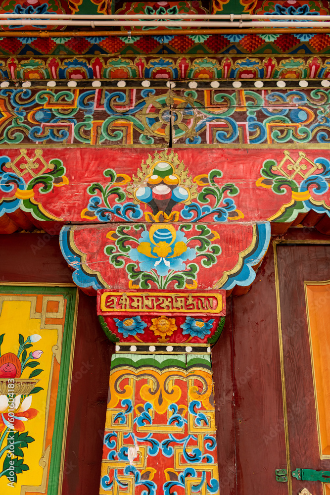 Shangri La, China - August 1 2021: Murals and wall decorations of Tibetan Buddhism mythology inside the famous Songzanlin Monastery in Shangri La. This is the begining of the Tibetan plateau in Yunnan