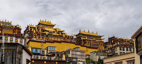 Panorama of Songzanlin Temple  is Tibetan Buddhist monastery in Zhongdian city  Shangri-La  Yunnan province  China  travel and tourists  famous place and landmark  religious and holiday concept