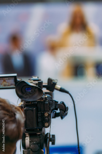 Media cameras capture moments at a trade show