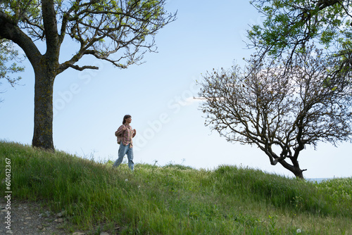 Fototapeta Naklejka Na Ścianę i Meble -  Woman  with trees