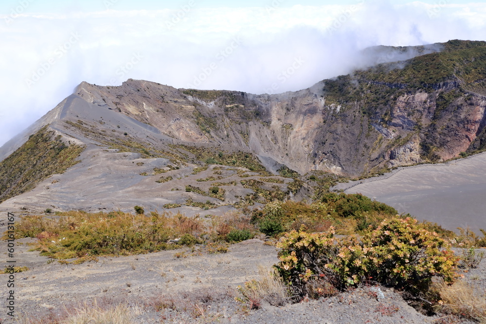 Costa Rica. Irazu Volcano National Park (Spanish: Parque Nacional Volcan Irazu). View of the volcano and the lake in the crater. Costa Rica. Irazu Volcano National Park (Spanish: Parque Nacional Volcan Irazu). View of the volcano and the lake in the crater.