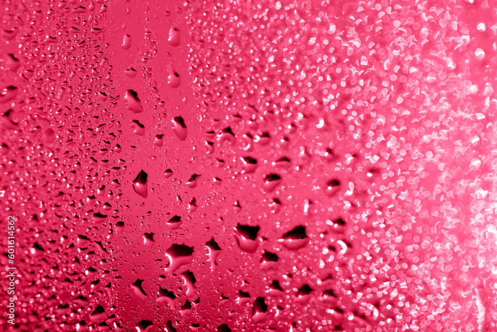 Drops on the glass in the glow of the sunset, magenta bokeh. The perfect background for your design and inspiration. Selective focus, defocus. Color of the year 2023 Drops on the glass in the glow of the sunset, magenta bokeh. The perfect background for your design and inspiration. Selective focus, defocus. Color of the year 2023