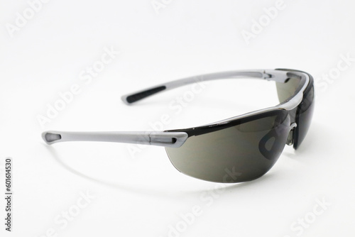 Photo of sports glasses  can also be used as sun glasses  these glasses are usually worn by cyclists. This photo has a white background