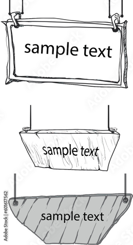 Wooden signs hang on ropes