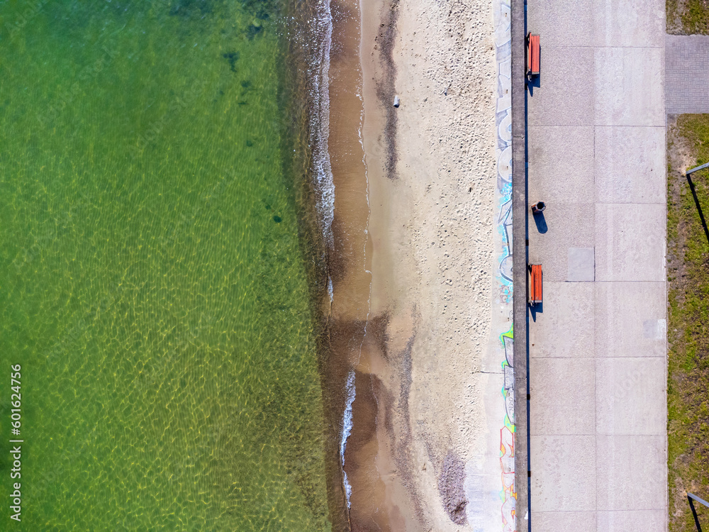 Aerial view landscape Poland Gdynia. Baltic sea, green water, seaside boulevard. Road by the beach. The pier.