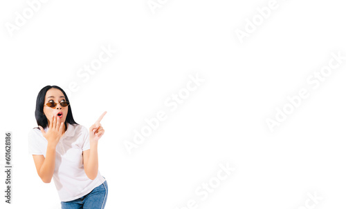 Excited screaming young woman standing isolated over white background Looking at blank space Surprised young lady shouting points at upper right corner Shocked excited young lady pointing aside space