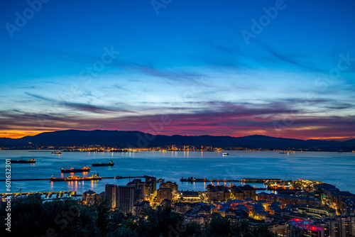 Sunset over Gibraltar town and the Bay of Gibraltar, UK © beataaldridge