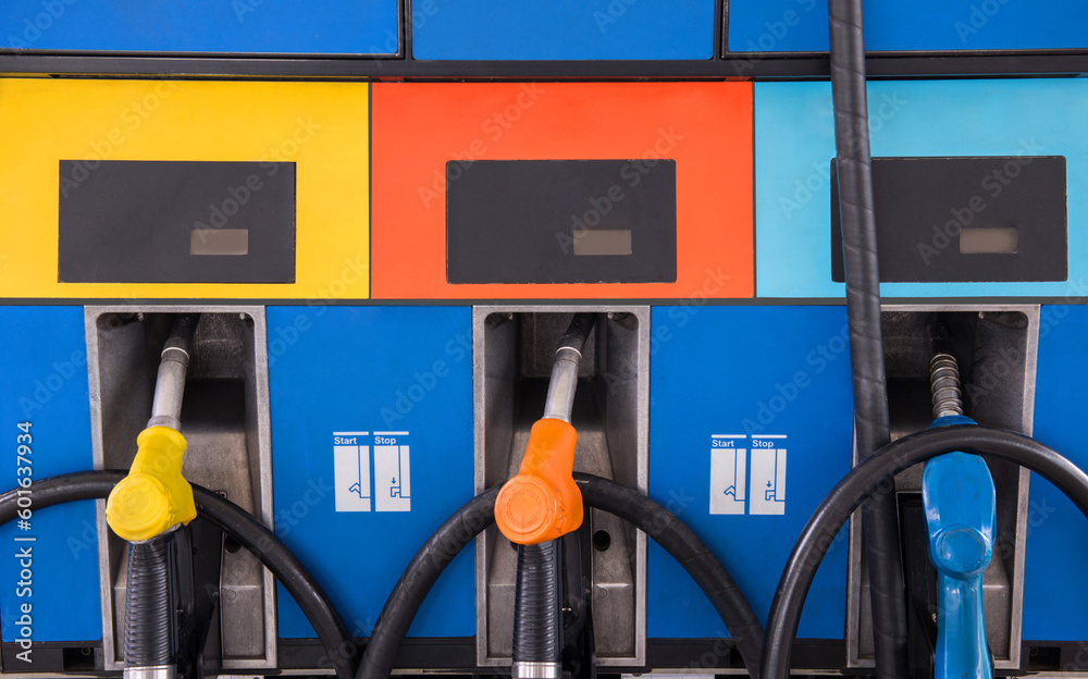 Close up of petrol fuel pistols at petrol station. Close up of petrol fuel pistols at petrol station.