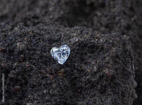 Close up of polished diamond on the rock. High quality photo