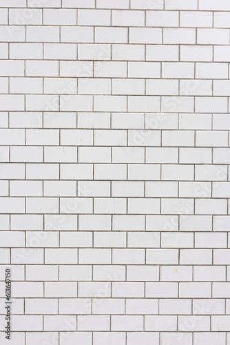White, porcelain tile wall