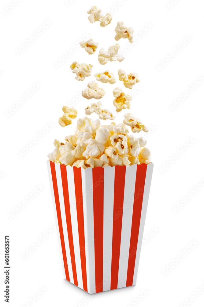 Popcorn flying out of red white striped paper box isolated on white, transparent background, PNG, with copy space. Splash, levitation of popcorn grains.