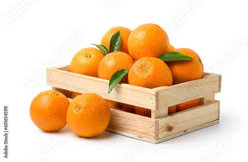 Fresh oranges with water droplets in wooden crate isolated on white background. Clipping path.