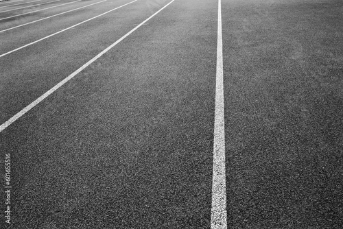 grey running track with white lines