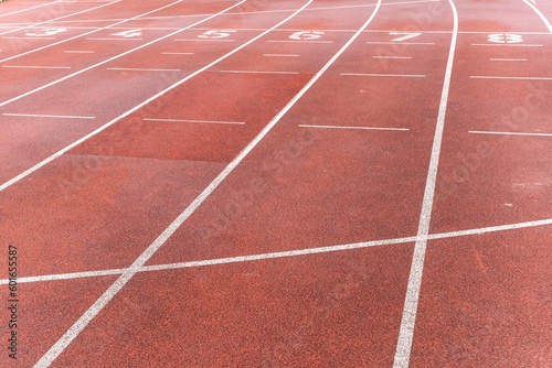 red running track with white lines