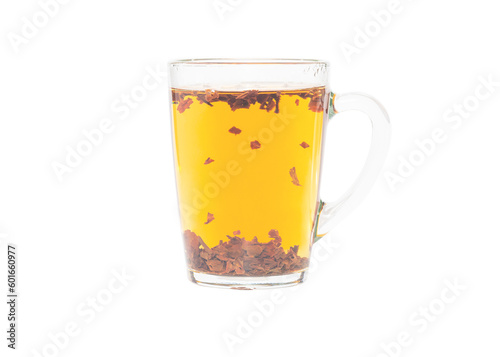 Brewing black tea in a transparent cup. Isolated on a white background.