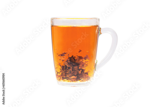 Black tea in a transparent glass cup. Shooted in motion. Cup isolated on a white background.