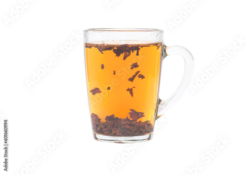 Brewing black tea in a transparent cup. Isolated on a white background.