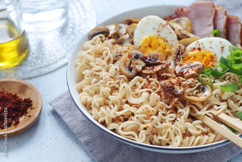 A bowl with ramen, an Asian noodle soup