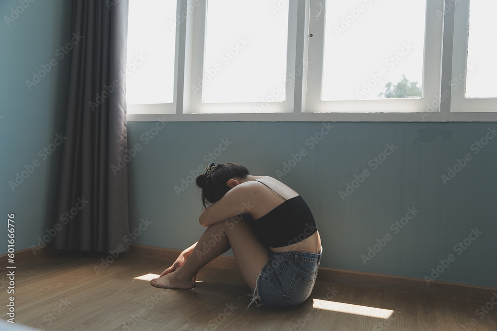 Fototapeta premium panic attacks alone young girl sad fear stressful depressed emotional.crying use hand cover face begging help.stop abusing domestic violence in women,person with health anxiety,people bad feeling down