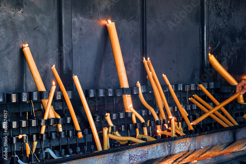 Canvas Print Lighting and burning candles as prayer and promise, Fatima, Portugal