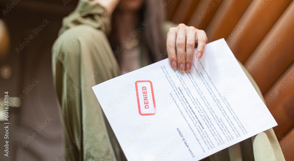 Φωτογραφία Young brunette long hair girl cries hysterically after being denied a mortgage loan